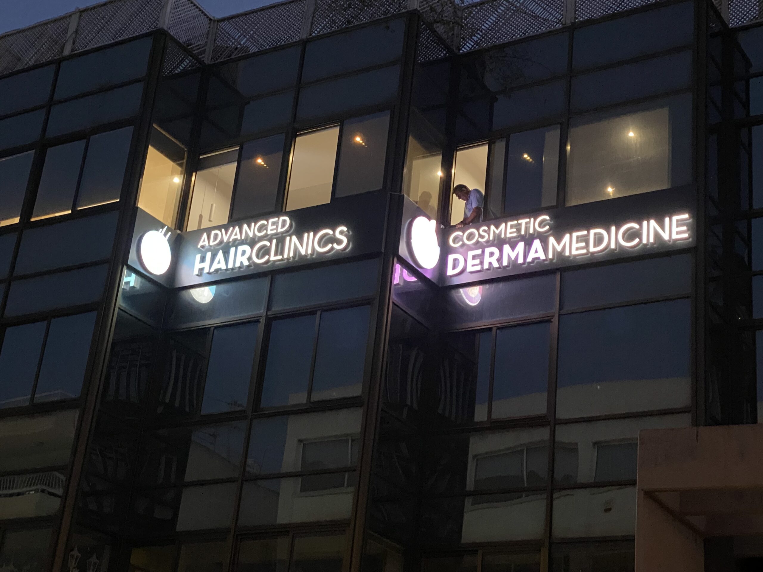 Illuminated 3D front-lit signs for Advanced Hair Clinics and Cosmetic DermaMedicine on building exterior