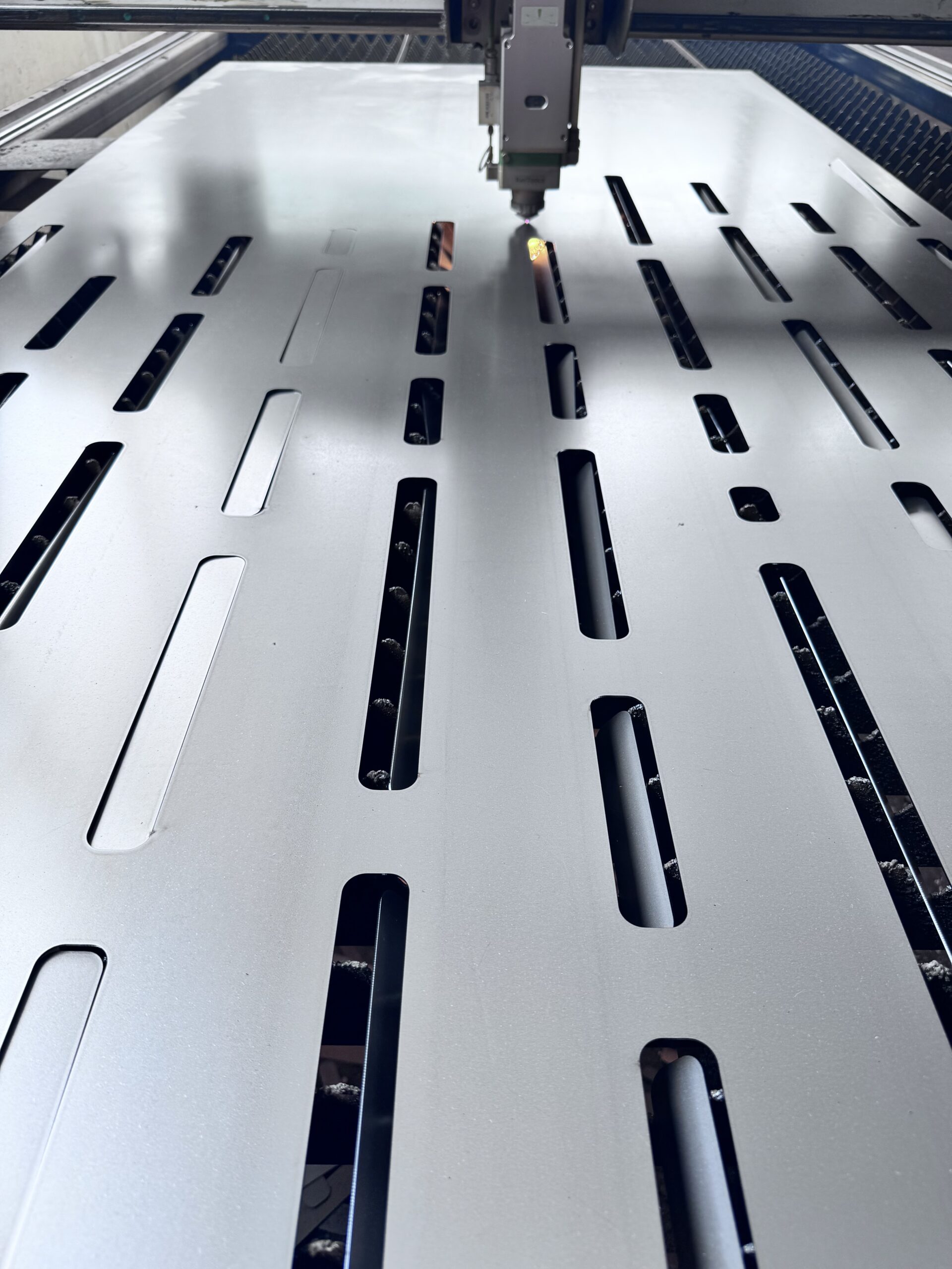 Fiber laser cutting machine precision-cutting steel panels with intricate designs in Nicosia