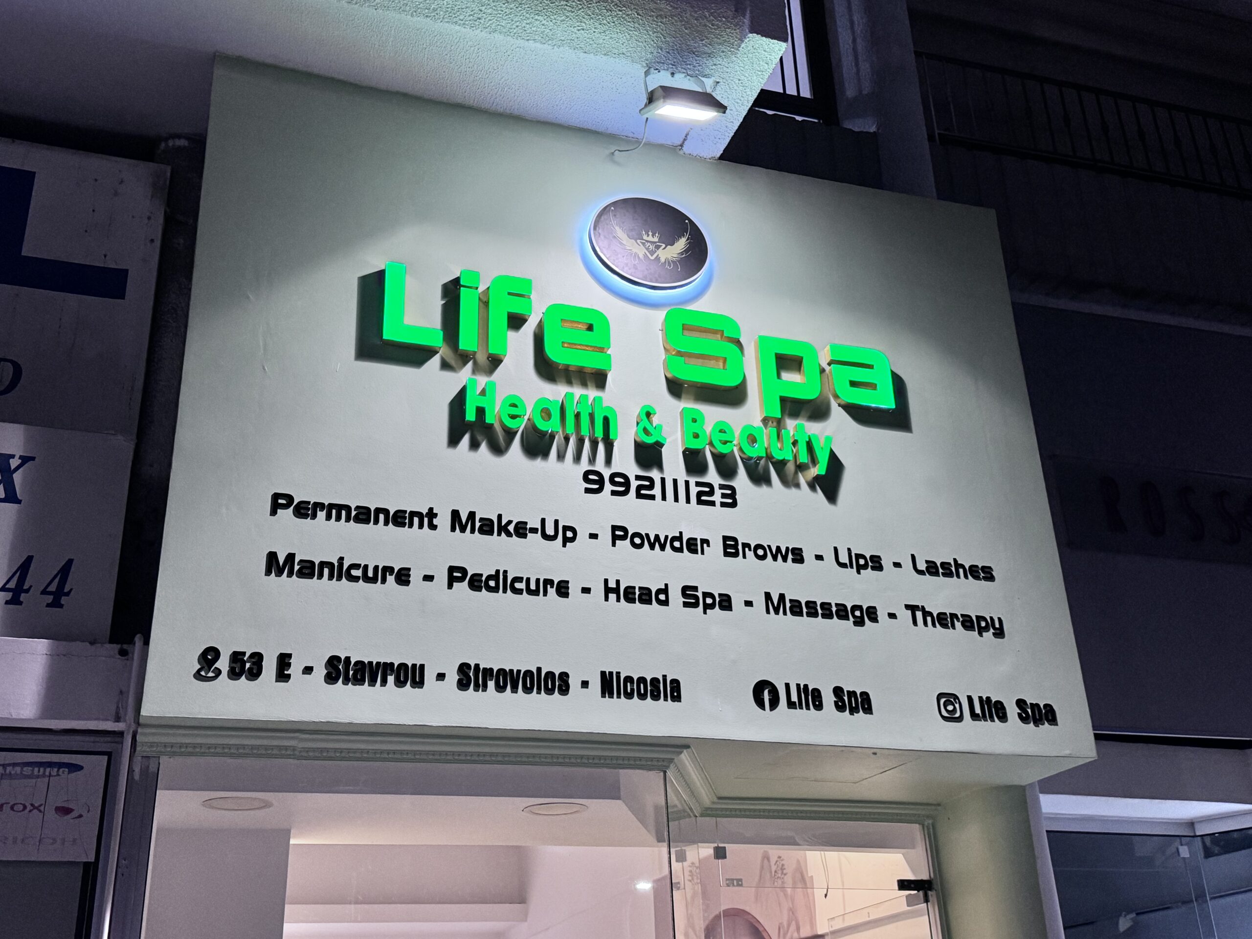 Illuminated 3D sign for Life Spa in Strovolos, Nicosia at night.